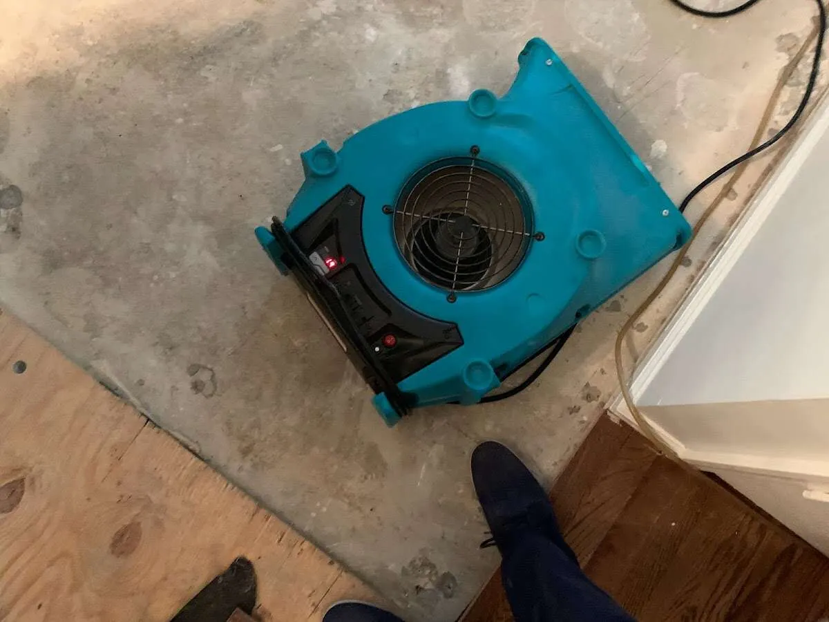 Air mover drying subfloor during Leak Detection & Repair in El Mirage